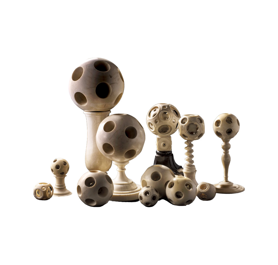 305 Twelve Turned And Pierced Ivory Spheres And Six Associated Bases In Ivory And Ebony Oliver Hoare Ltd